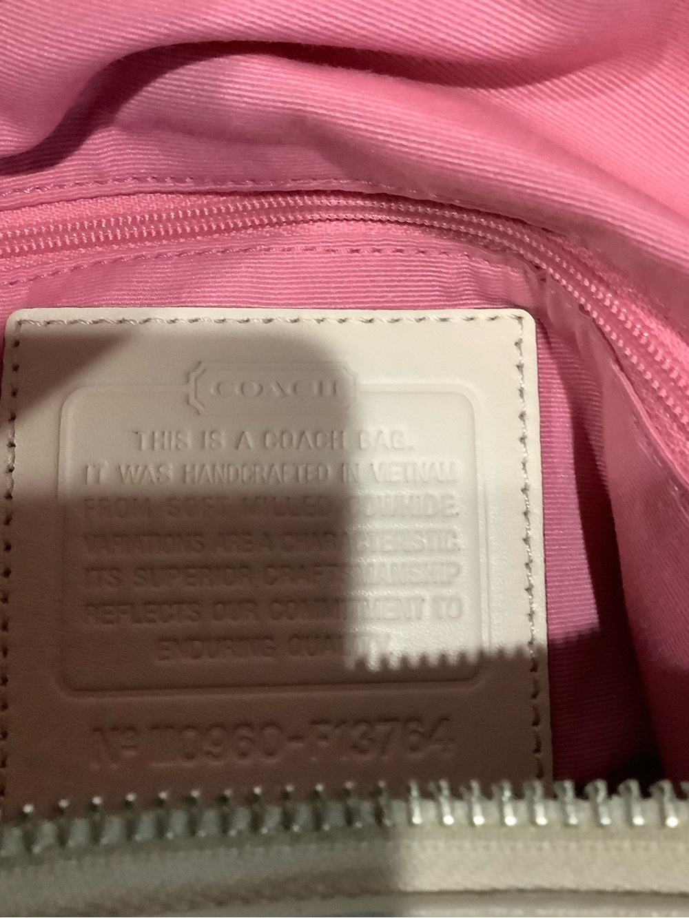 COACH Women's cream colored purse. Crossbody strap also.
